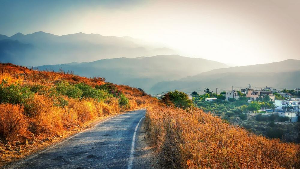 crete road in autumn